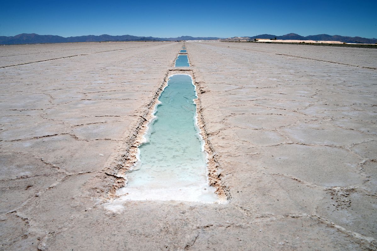 05 Salt Pool Stretches Into The Distance At Salinas Grandes Dry Salt Lake Argentina